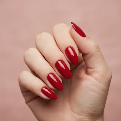 Macro Close-up of Glossy Cherry-red Almond Nails