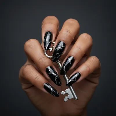 Black Marble Nails With Silver Chrome Veining on Long Almond Shape