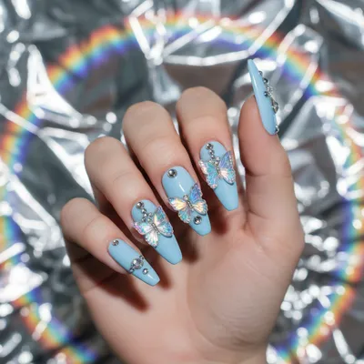 Y2K Holographic Butterfly-charm Long Stiletto Nails on a Baby-blue Bas