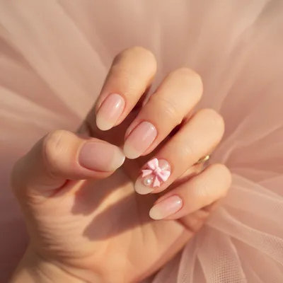 Coquette Ribbon Bow Detail on Short Almond Nails — Sculpted Pink Ribbo