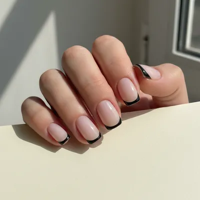 French-revival Modern Thin Black-tip Squoval Nails on a Milky Base — c