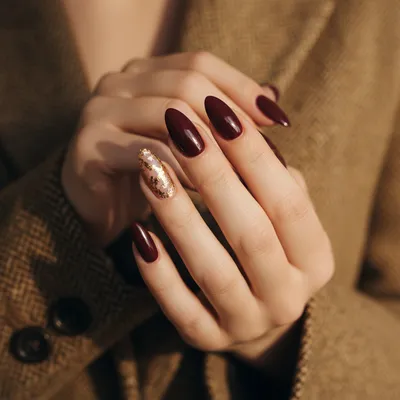 Deep Wine Burgundy Long Oval Nails With a Thin Gold-foil Flake Accent