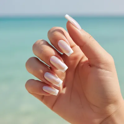 Vacation Long Coffin Nails in Pearl Chrome With a Clean White French t