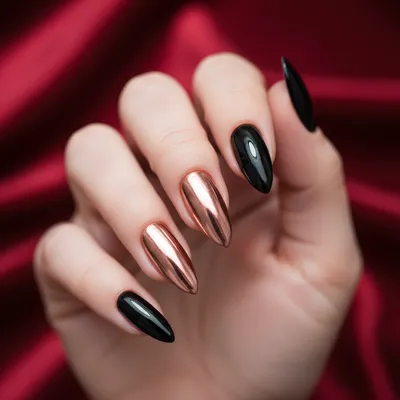 Rose-gold-chrome Accent Finger on Long Stiletto Nails With Otherwise g