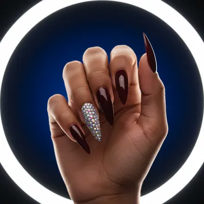 Burgundy Oxblood Long Stiletto Nails With Full Rhinestone Cluster on t