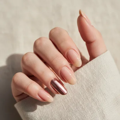 Beige Sheer-nude Long Oval Nails With Rose-gold-chrome Accent Finger