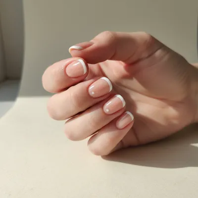Minimal-aesthetic Short Round Nails in Bare Buff With a Fine Micro-fre