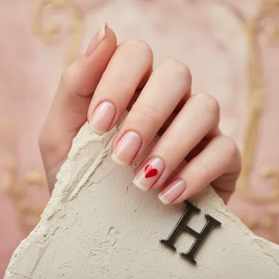 Minimal-aesthetic Short Squoval Nails With a Single Tiny Hand-painted